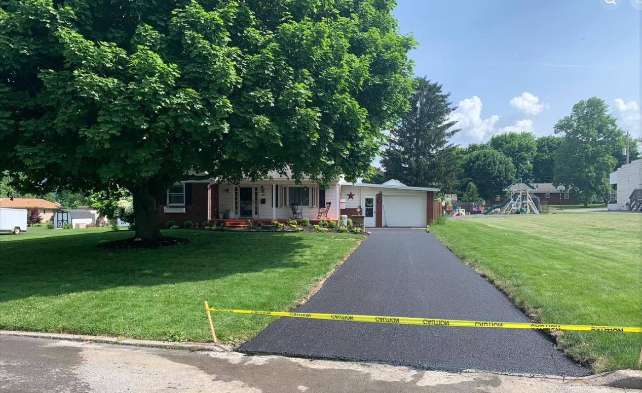 Newly paved driveway suburban home